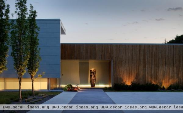 contemporary exterior by McKay Landscape Lighting