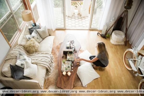 beach style living room by Ashley Camper Photography