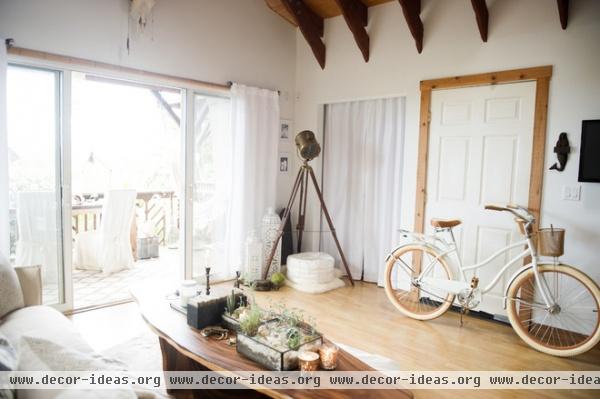 beach style living room by Ashley Camper Photography