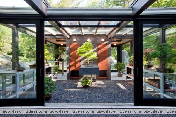 modern garage and shed by Flavin Architects