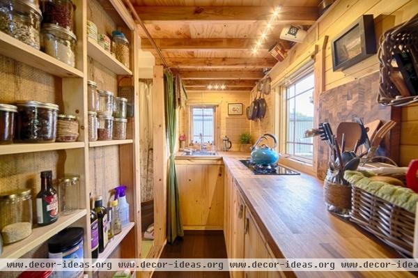 rustic kitchen by The Tiny Tack House