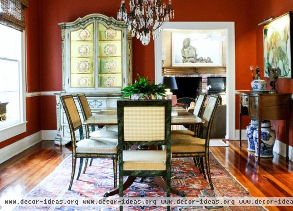 traditional dining room by Mina Brinkey