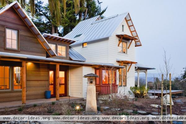 rustic exterior by Arkin Tilt Architects