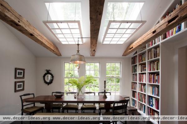 rustic dining room by Sullivan Building & Design Group