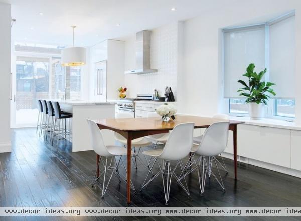 contemporary dining room by Andrew Snow Photography