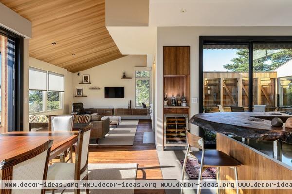 midcentury dining room by Hudson Street Design