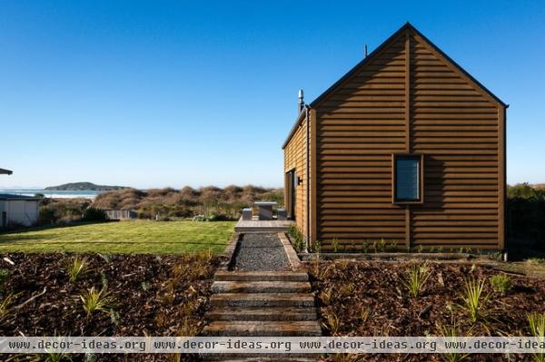 beach style exterior by Mason & Wales Architects