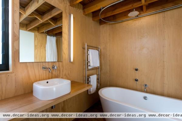 beach style bathroom by Mason & Wales Architects