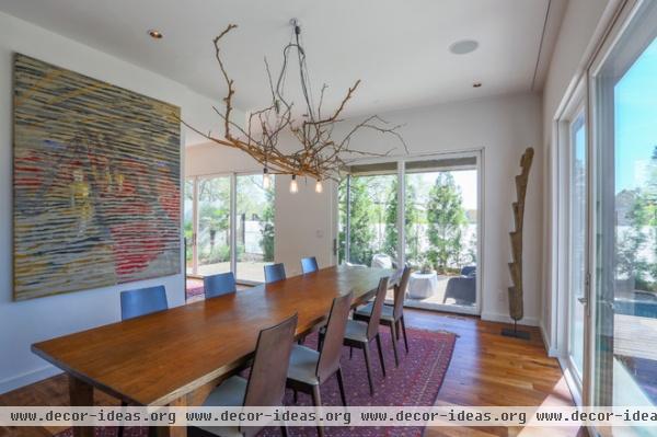 contemporary dining room by TaC studios, architects