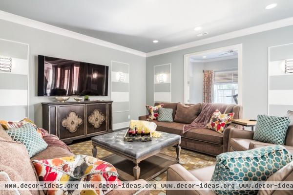 transitional media room by Eric Ross Interiors, LLC