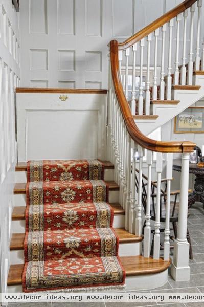 farmhouse staircase by Archer & Buchanan Architecture, Ltd.