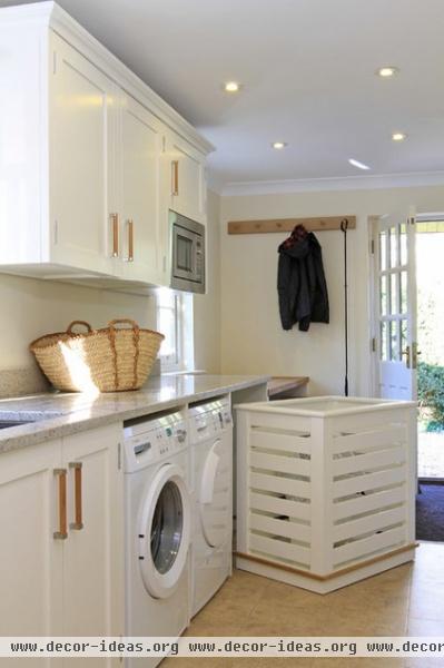 traditional laundry room by Beau-Port Kitchens