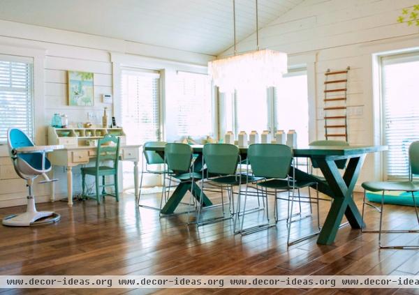 beach style dining room by Mina Brinkey