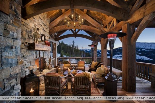 rustic porch by Locati Architects