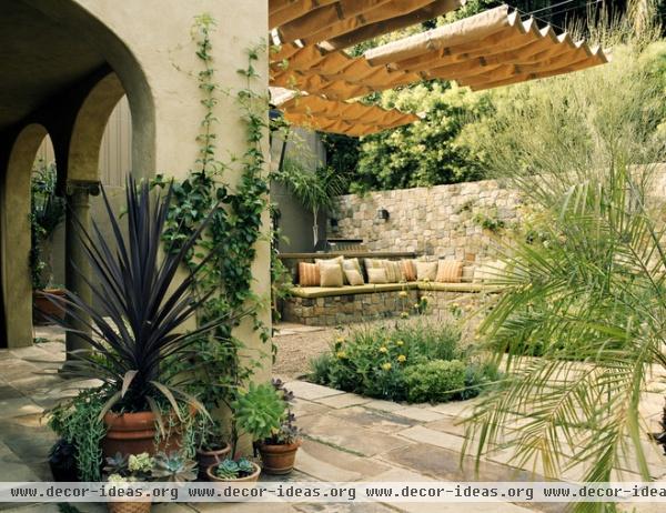 mediterranean patio by Tommy Chambers Interiors, Inc.