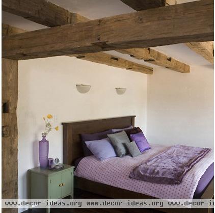 rustic bedroom by Mark English Architects, AIA