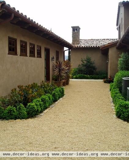 mediterranean landscape by The Design Build Company