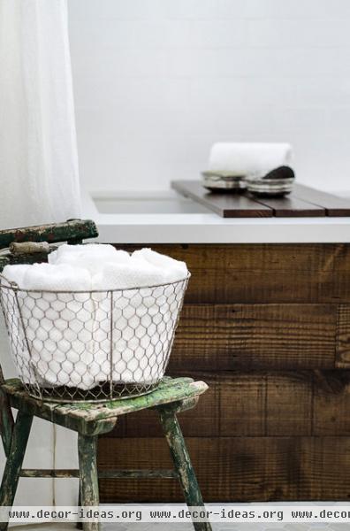 farmhouse bathroom by FOUR POINT Design+Construction Inc.