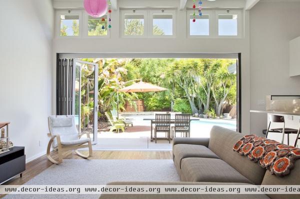 midcentury family room by Klopf Architecture