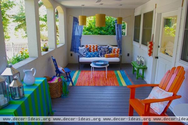 eclectic patio by G Family, Inc.