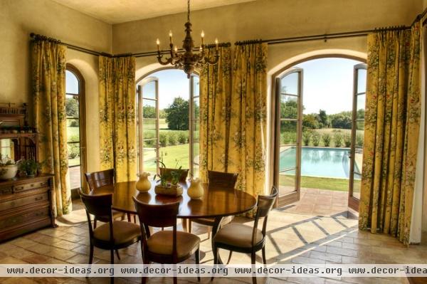 mediterranean dining room by Gabriel Builders Inc.