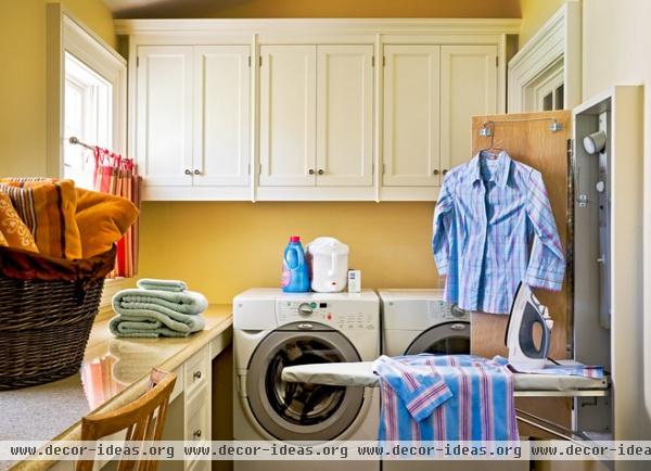 farmhouse laundry room by Crisp Architects