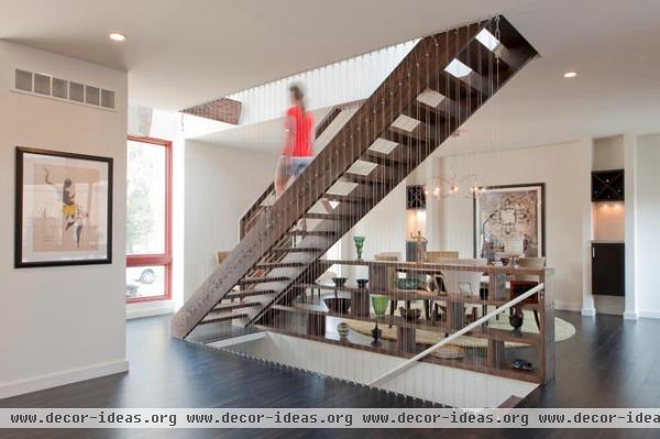 contemporary staircase by Urban Improvement Company