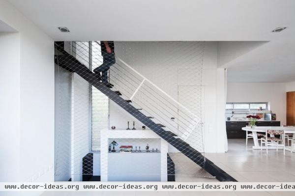 modern staircase by arbejazz architects studio ltd.