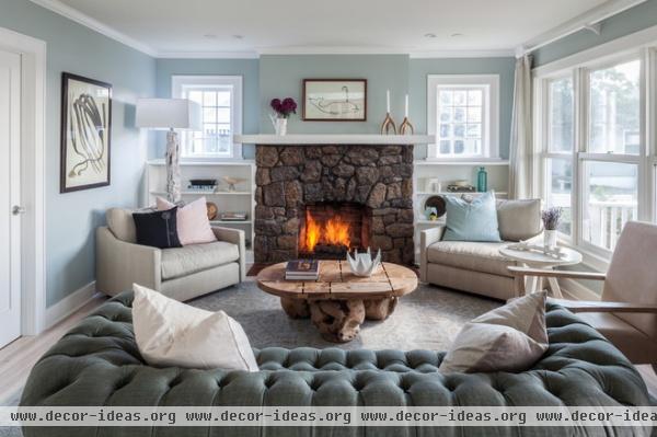 beach style family room by Stone Creek Builders