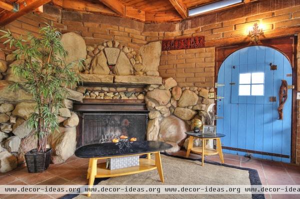 rustic living room by Realtor at Berkshire Hathaway (Angelos Properties)