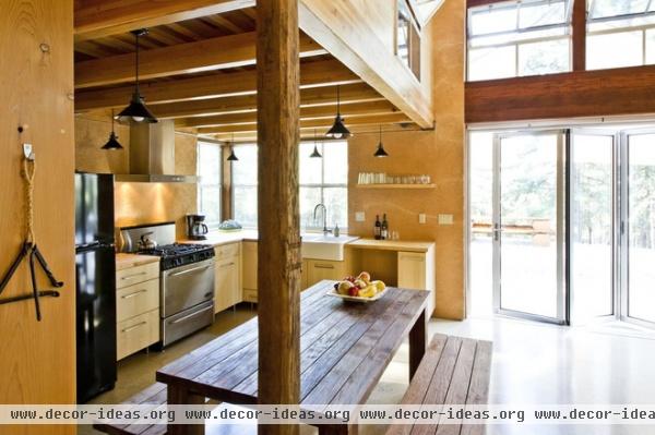 rustic kitchen by Arkin Tilt Architects