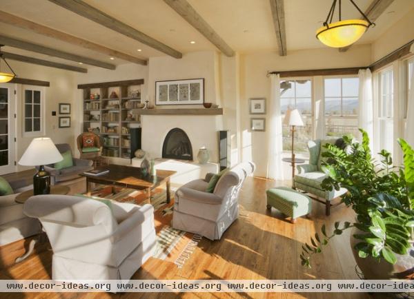 rustic living room by Lynne Barton Bier - Home on the Range Interiors