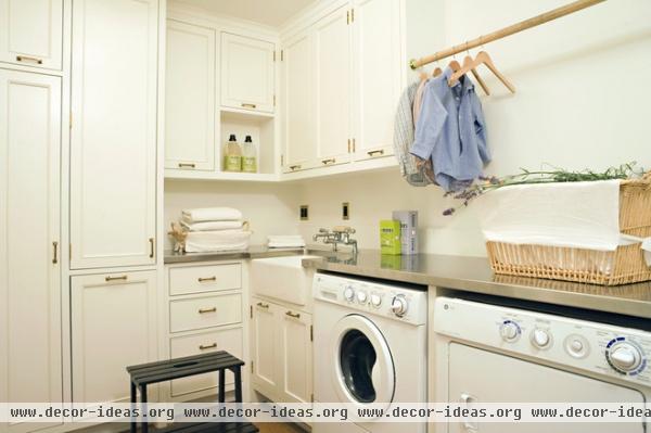 transitional laundry room by Tim Barber LTD Architecture & Interior Design