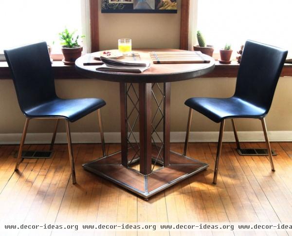 industrial dining room by SOLO Home Design