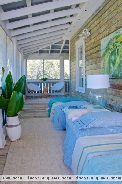 beach style porch by Starr Sanford Design