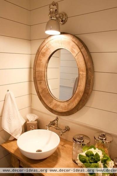 beach style bathroom by Munger Interiors