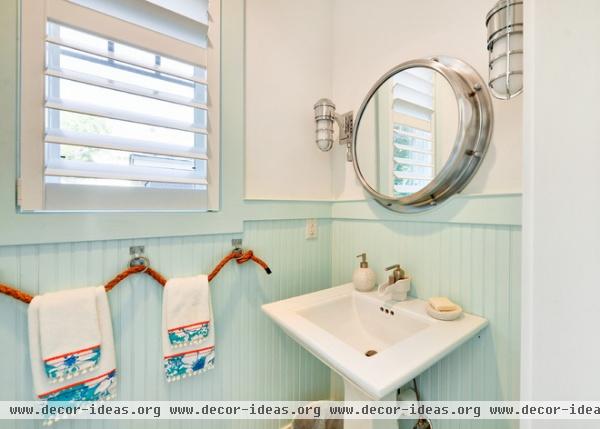 beach style powder room by Echelon Custom Homes