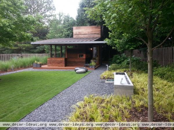 rustic garage and shed by CORE Landscape Group