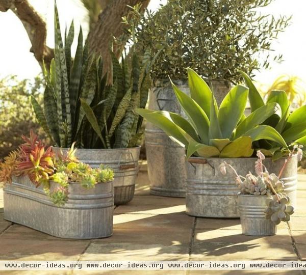 eclectic outdoor planters by Pottery Barn