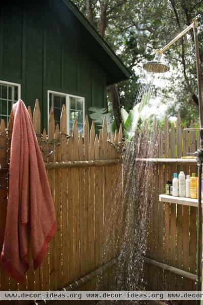 tropical bathroom by Ashley Camper Photography