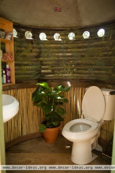 tropical bathroom by Ashley Camper Photography