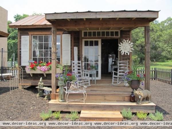 eclectic garage and shed by Iron Accents