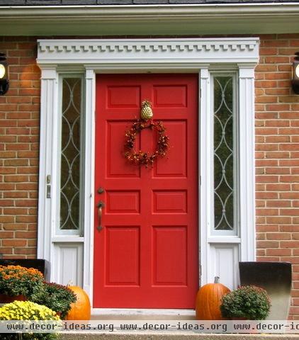 traditional exterior Red Front Door With Pineapple Knocker