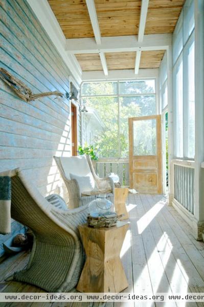 beach style porch by Starr Sanford Design