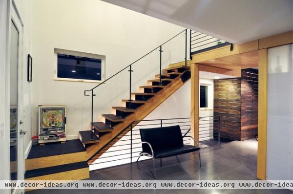 contemporary staircase by B9 Architects Inc