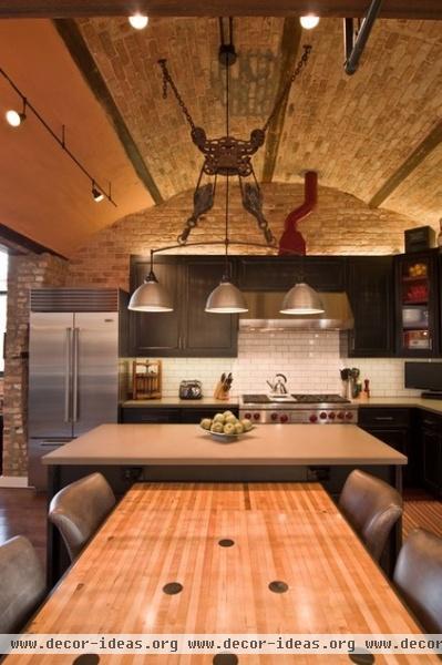 industrial kitchen by Besch Design, Ltd.