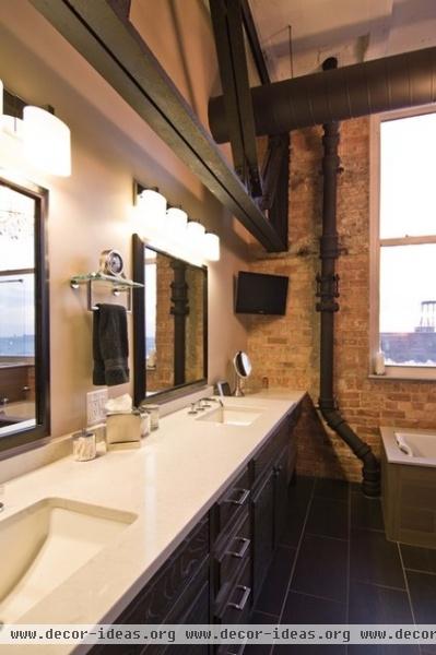 industrial bathroom by Besch Design, Ltd.