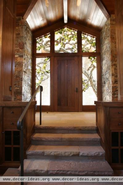 rustic entry by Mahoney Architects & Interiors