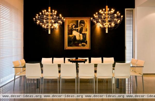 modern dining room by Moshi Gitelis - Photographer