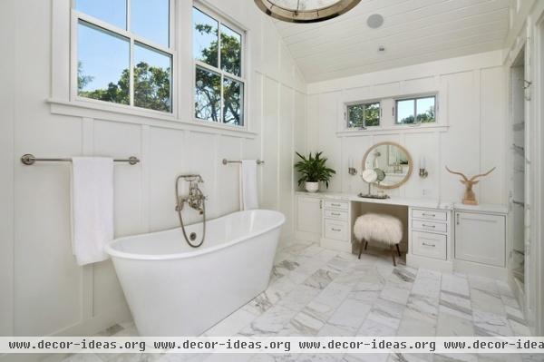 farmhouse bathroom by Simpson Design Group Architects